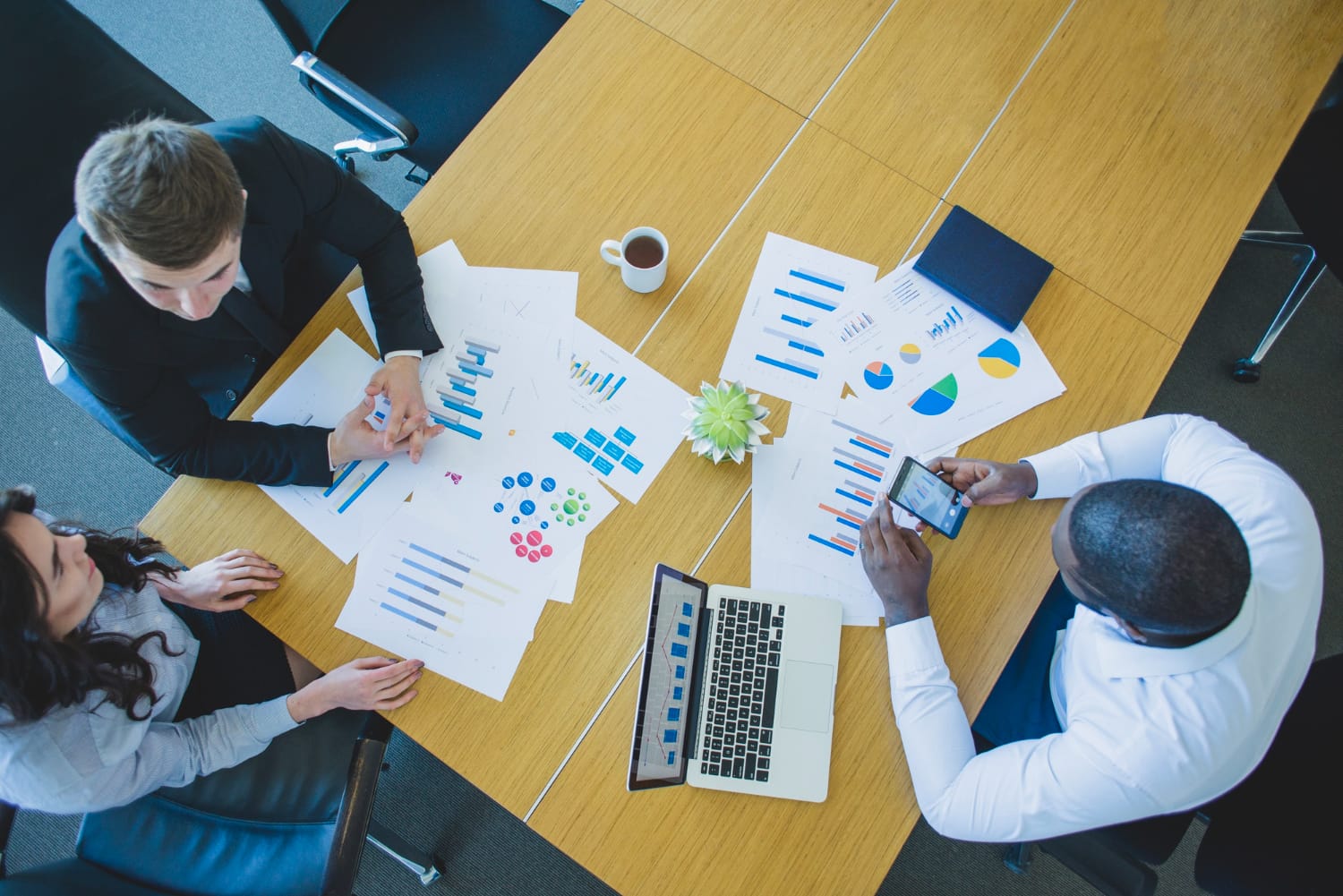 Professional sales team collaborating or abstract graphic representing sales execution engine